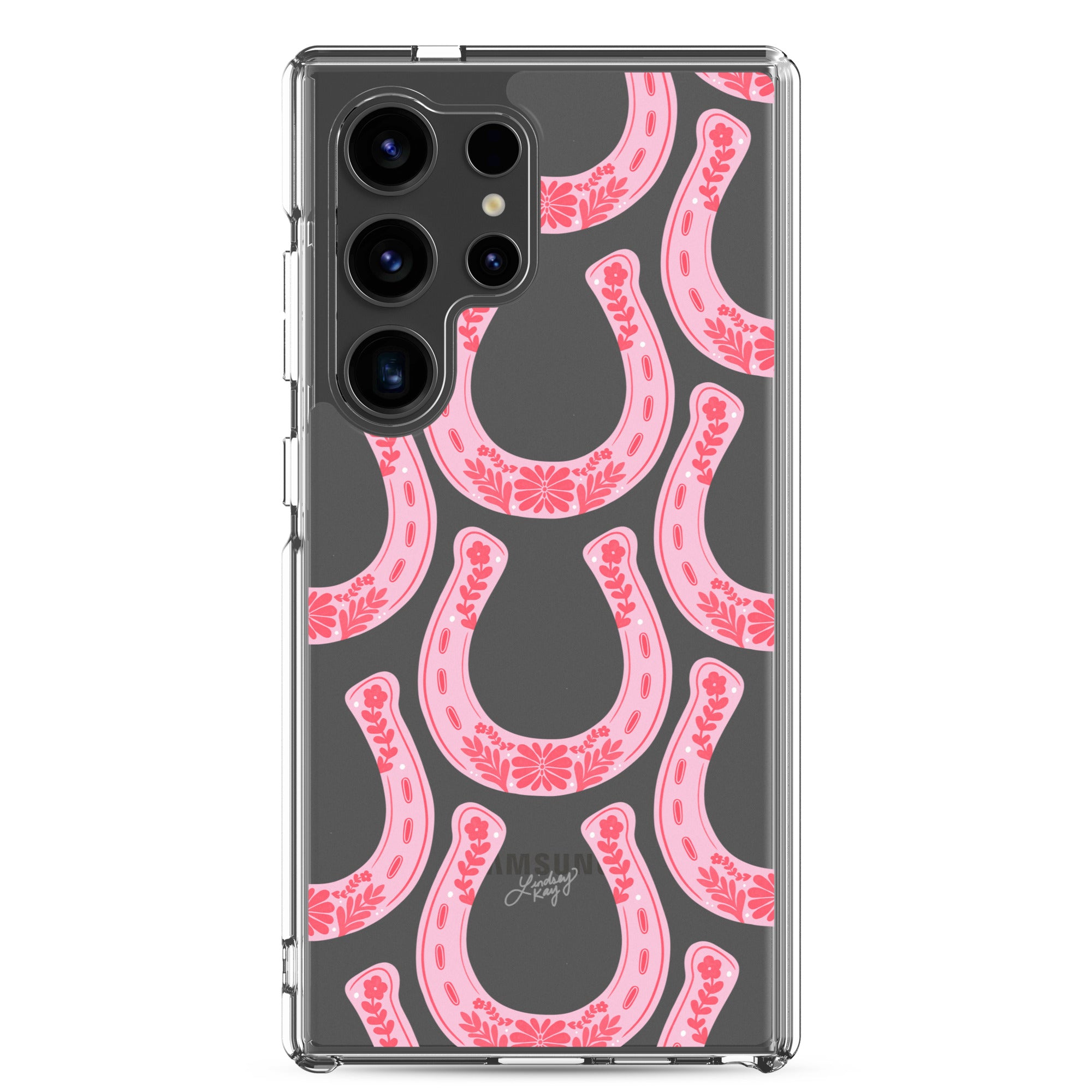 Clear durable Samsung phone case with a pink floral western horseshoe pattern, perfect for any trendy cowgirl. Original design by Lindsey Kay Collective.